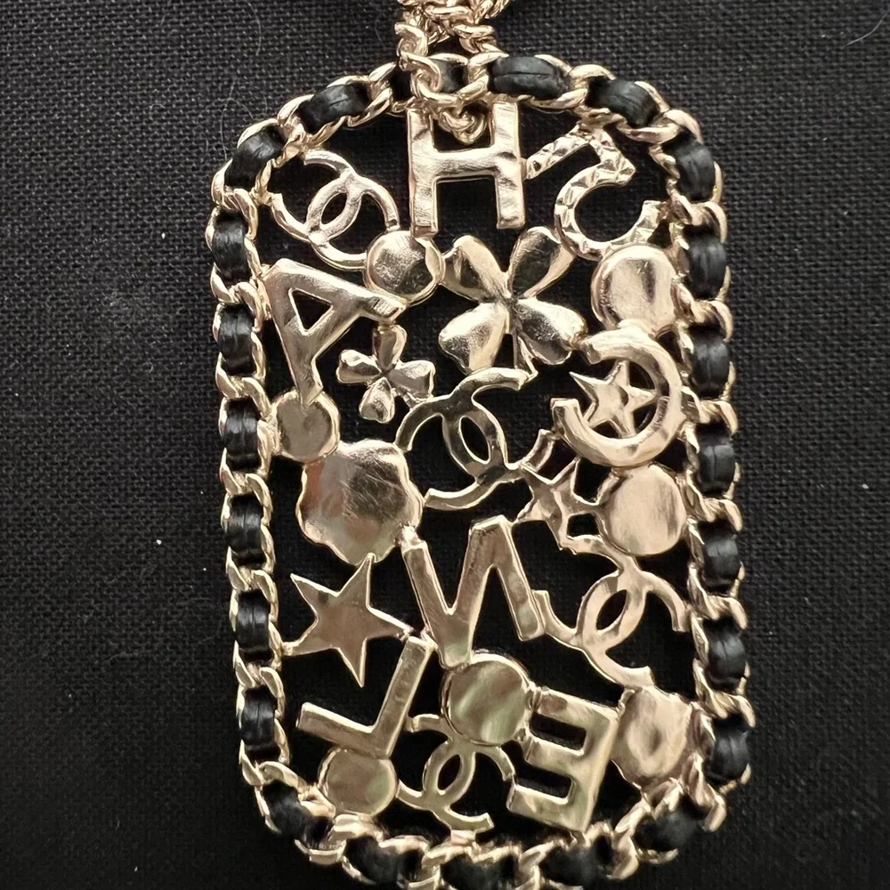 CHANEL Pendant Necklace Clover Lambskin Leather Chain Logo Crystal Mosaic Pearl